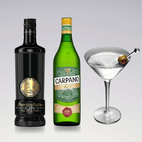 Puerto de Indias gin bottle, Carpano dry vermouth, and a garnished dry martini cocktail glass.