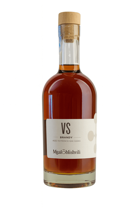 Mgaloblishvili Brandy VS 500ml bottle - Georgian brandy with rich amber hue, notes of dried fruit, vanilla, caramel; perfect for sipping.