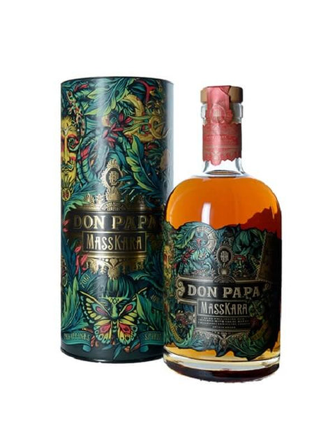 Don Papa Masskara Flavored Rum bottle and packaging featuring intricate tropical designs.