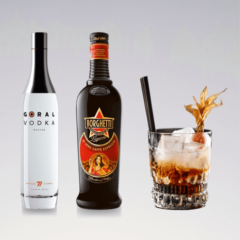 Goral Vodka, Caffè Borghetti coffee liqueur, and White Russian cocktail with ice in a glass, garnished and ready to serve.