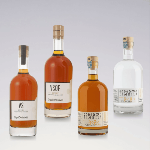Premium Georgian Oak Spirit Collection featuring Georgian brandy and chacha bottles.