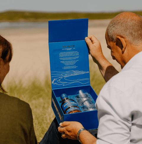 Kilchoman Machir Bay Islay Single Malt 700ml Gift Pack with 2 Glasses on a beach setting