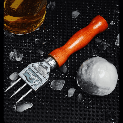 Bar Ice Pick with Wooden Handle on a bar mat, surrounded by ice cubes and a glass of drink.
