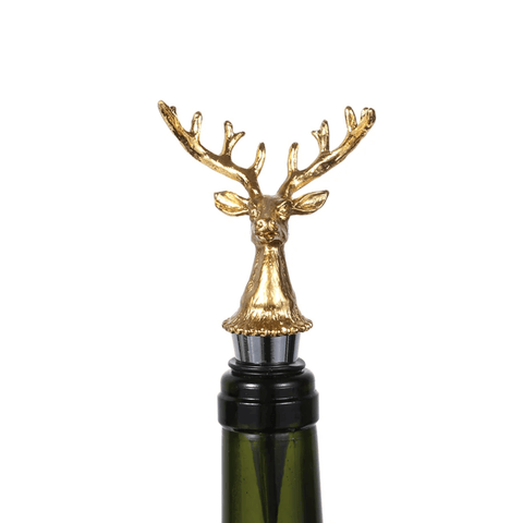Gold Deer Head Wine Bottle Stopper Metal displayed on a wine bottle, featuring a detailed gold deer head design for an elegant touch.