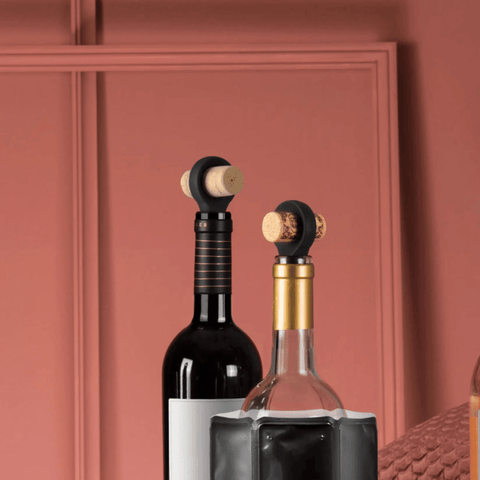 Vacu Vin Bottle Stoppers Set on wine bottles; premium stoppers for preserving wine freshness by Dutch brand Vacu Vin.