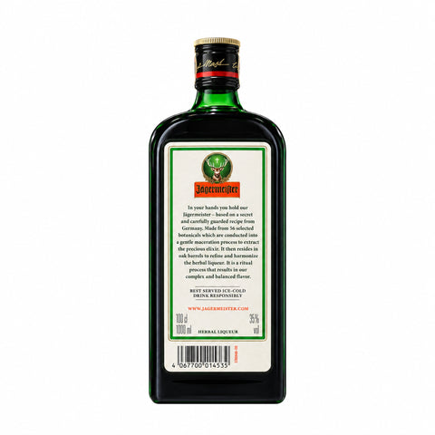 Back view of Jagermeister Herbal Liqueur 1 L bottle, green glass with label details, 35% alcohol, made in Germany. Focus keyword: Jagermeister Herbal Liqueur.