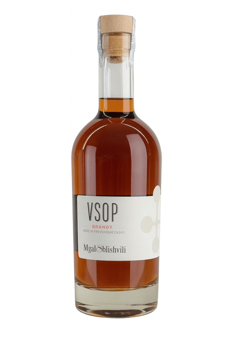 Mgaloblishvili Brandy VSOP bottle, 0.500 ml, 40% alcohol, deep amber color, crafted in Georgia, featuring aromas of dried fruits and vanilla.