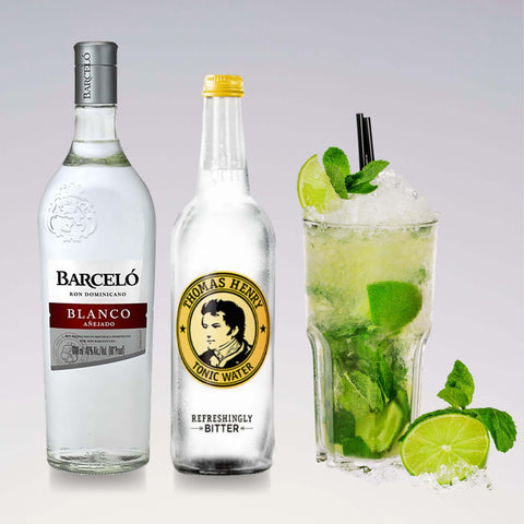 Mojito cocktail with Barcelo Blanco rum, Thomas Henry tonic water, mint, and lime, showcasing refreshing ingredients for a perfect drink.