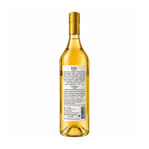 Back label of Schuchmann Gold Oak Aged Chacha 500ml bottle showing details in Georgian and English.